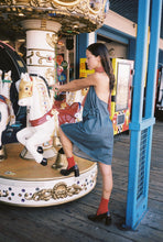 Load image into Gallery viewer, And Everything Nice Denim Wrap Dress with Pockets
